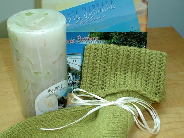 Rachel's sage green socks, candle and Santa Barbara post cards
