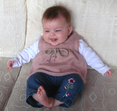 Olivia in pink sweater