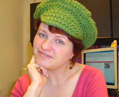 Tammy in green newsboy cap